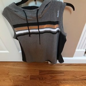 Pullover sports vest with hoodie.
